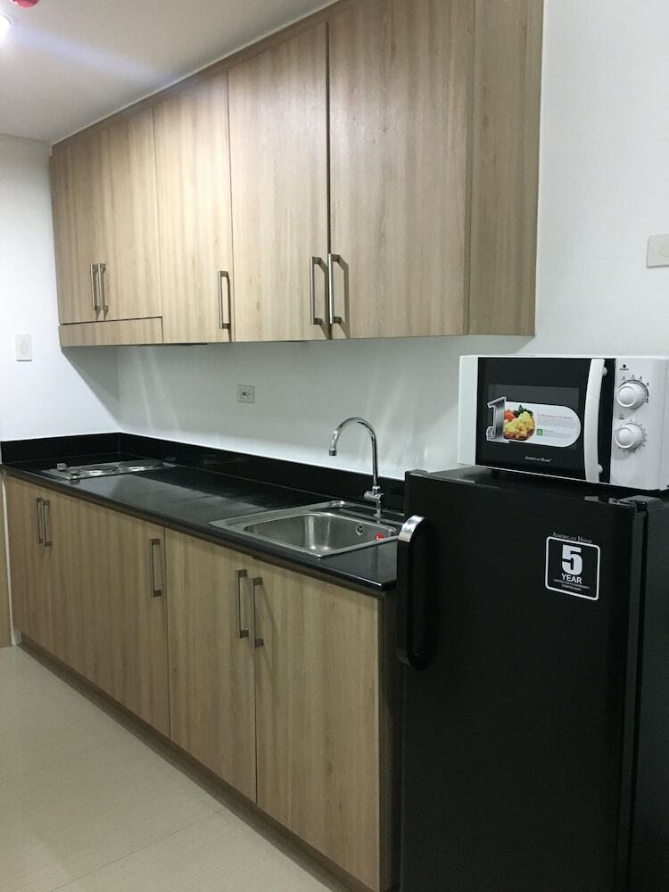 Usp Suites At Shore Residences