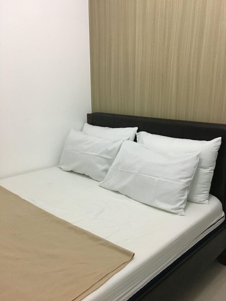 Usp Suites At Shore Residences