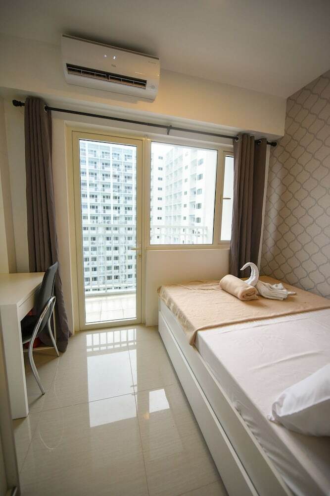 Usp Suites At Shore Residences
