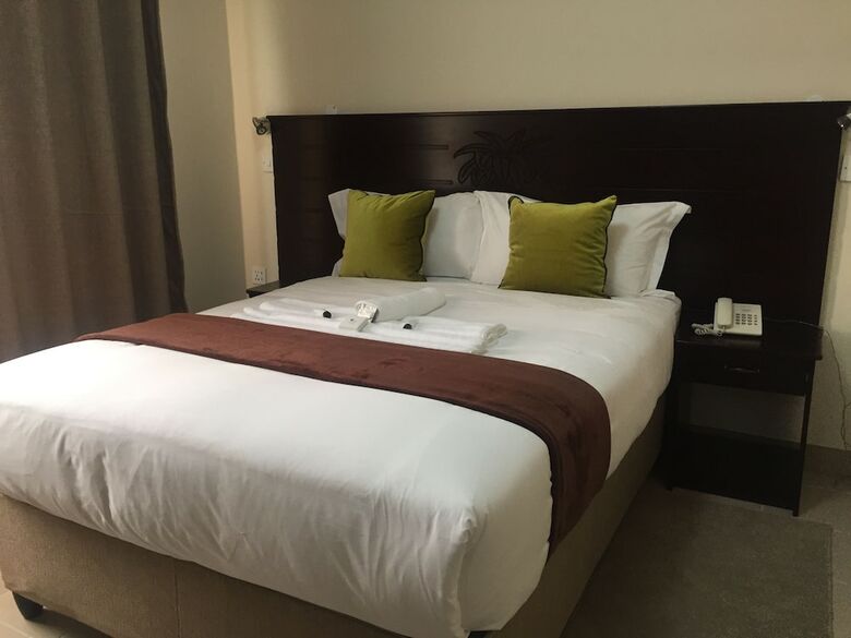 Cycad Palm Hotel