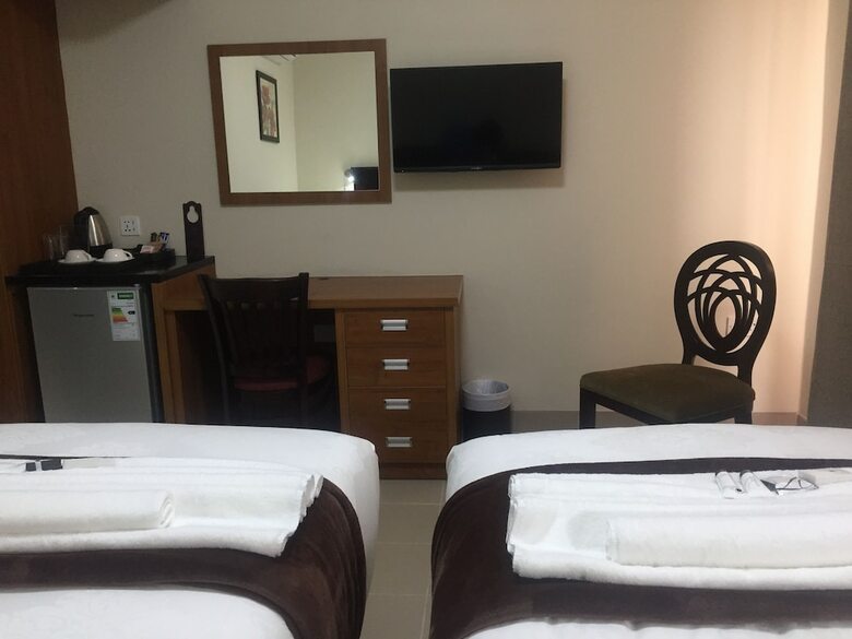 Cycad Palm Hotel