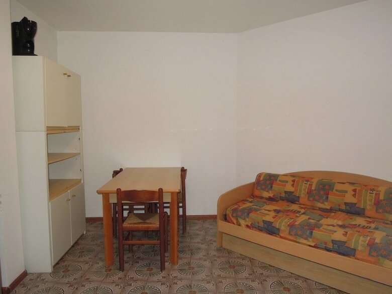Apartamento Villaggio Olimpia