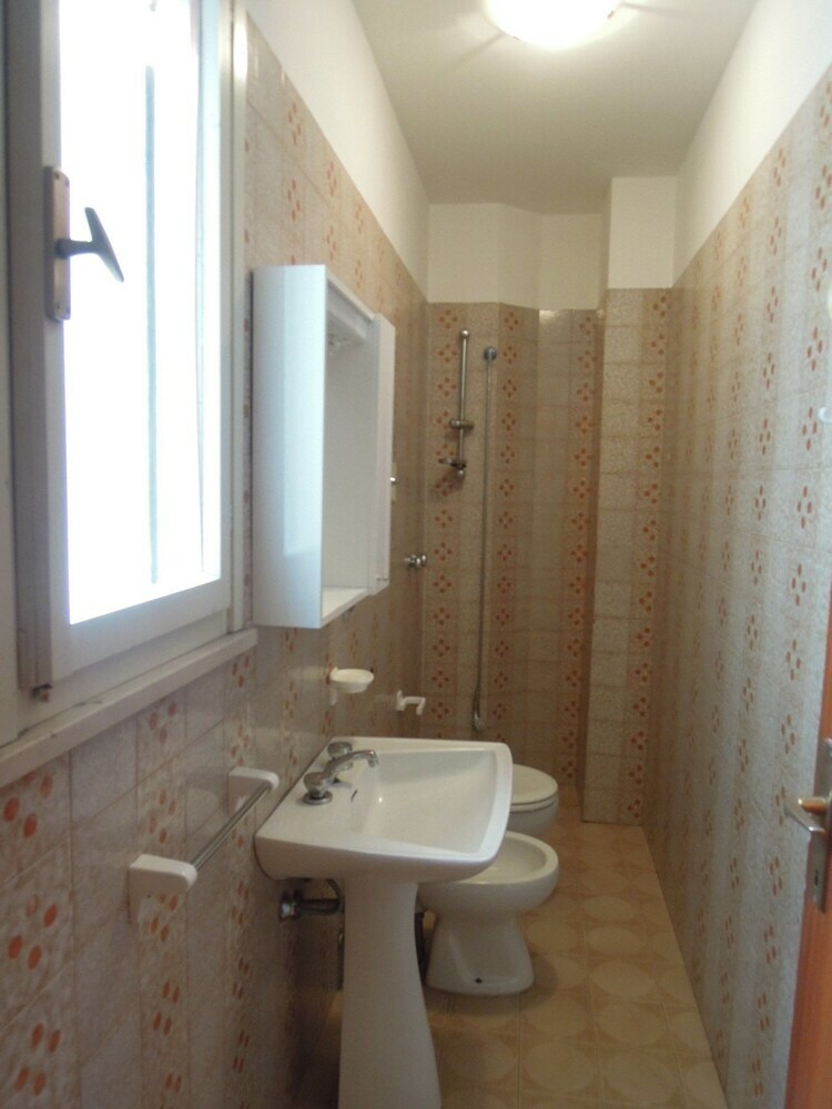 Apartamento Villaggio Olimpia