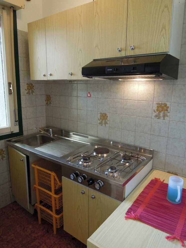 Apartamento Villaggio Olimpia