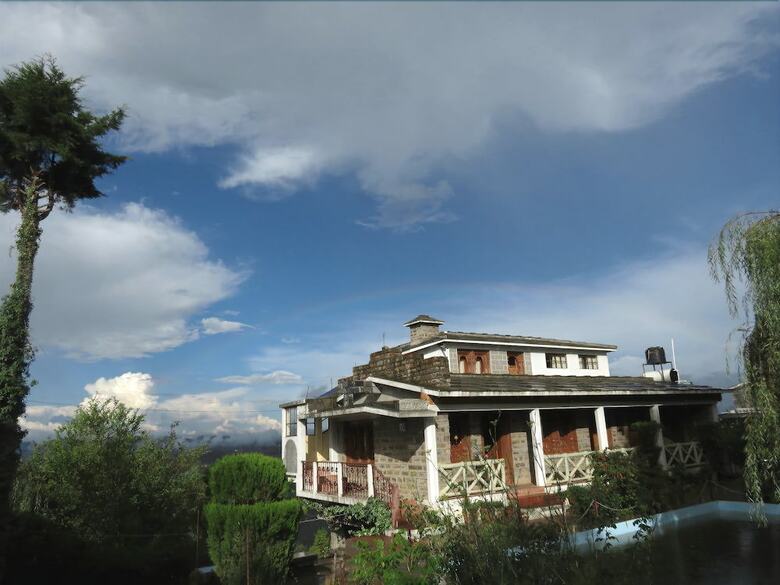 Apartamento Trishul Orchard Resort