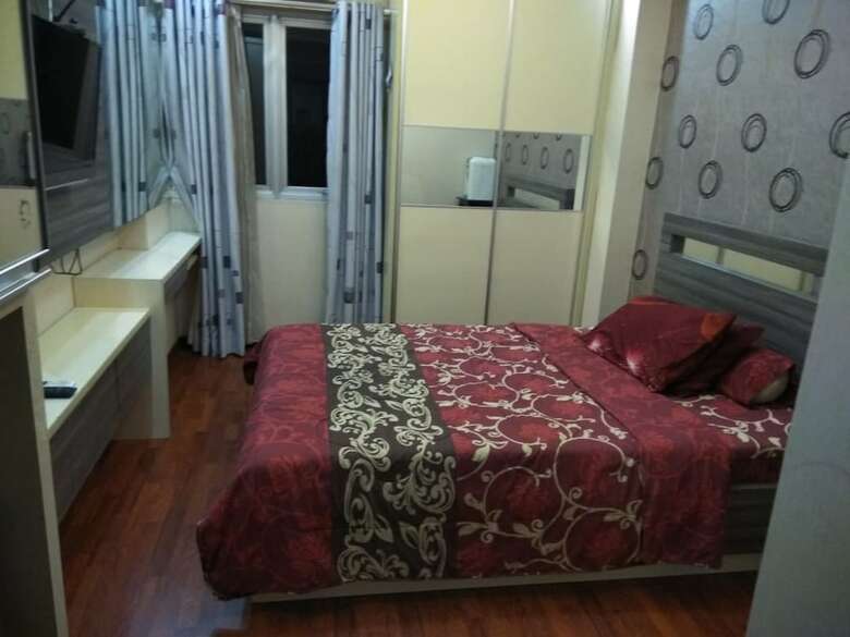 Apartment The Suites Metro By Herlan