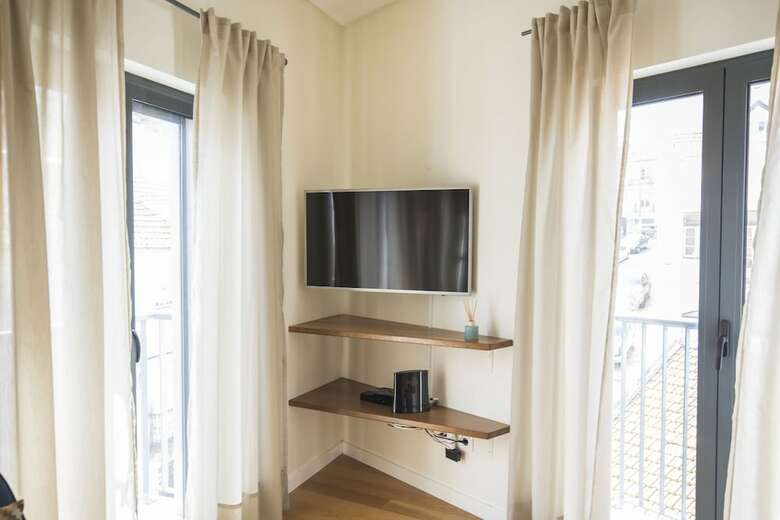 Apartamentos Gra�a Heartwarming Flat