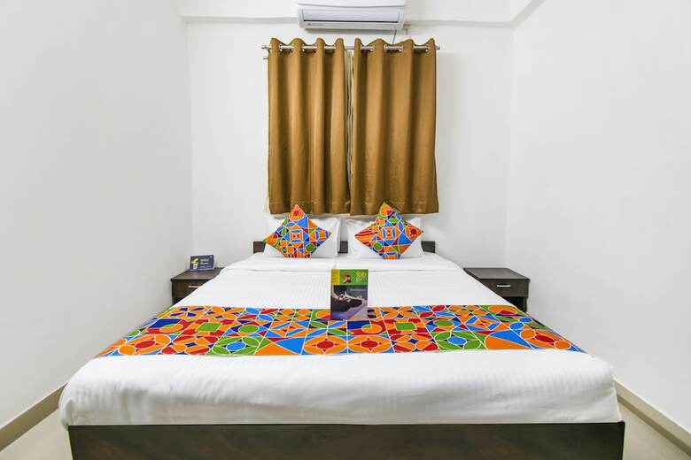 Fabhotel Purple Orchid