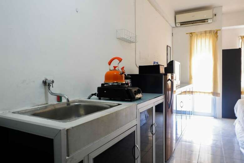 Homey Studio Puri Mas Apartment