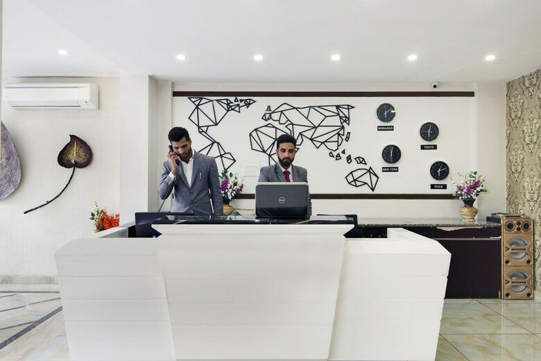 Capital O 28688 The Saffron Hotel