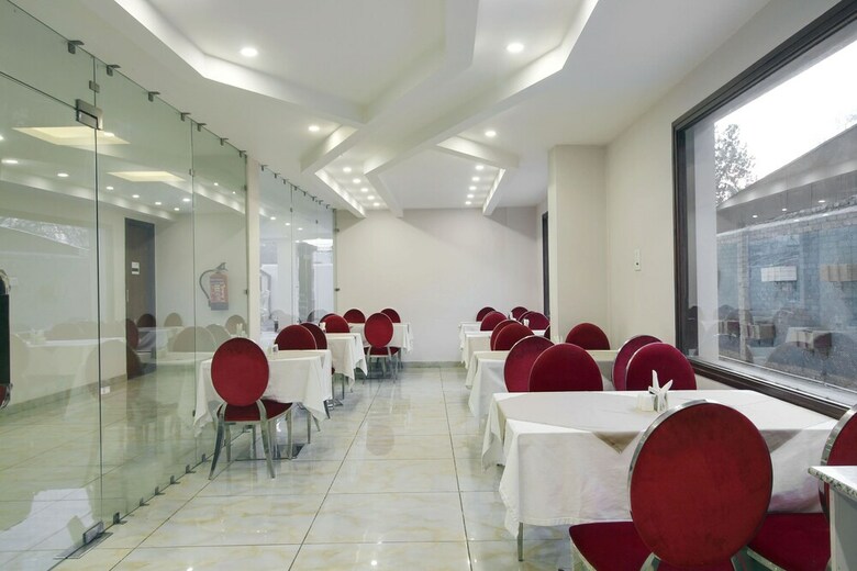 Capital O 28688 The Saffron Hotel