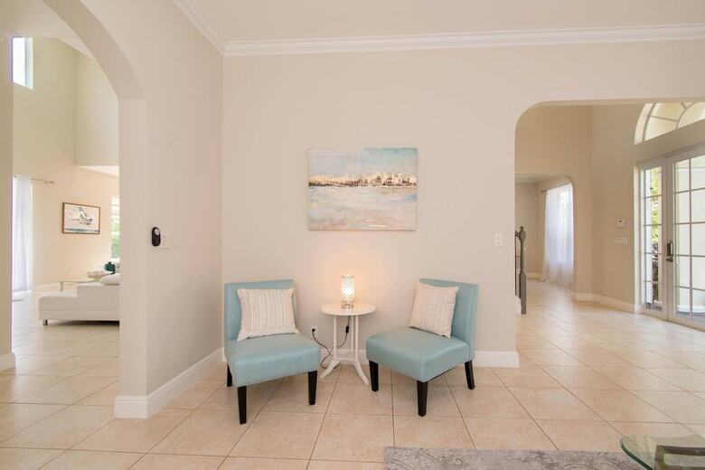 Gorgeous 5 Bedroom Home W/heated Pool Canal Front