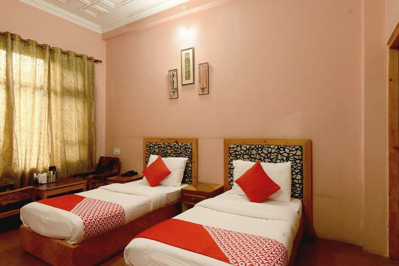 Oyo 18674 Airport Inn Hotel