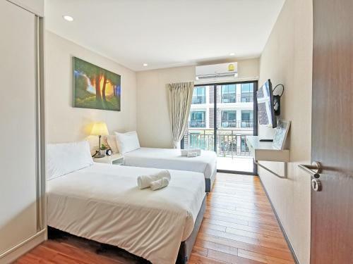 Apartamentos The Title West Wing By Trips Phuket