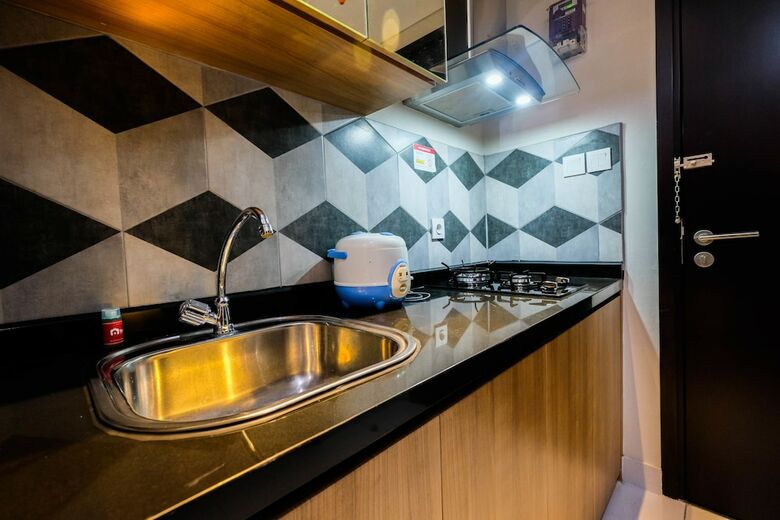 Homey And Tranquil Studio Casa de Parco Apartment
