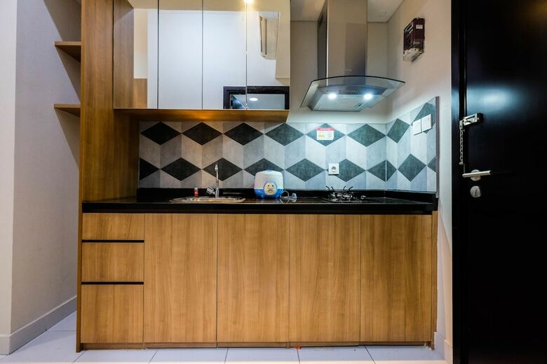 Homey And Tranquil Studio Casa de Parco Apartment