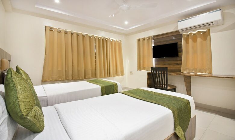 Treebo Trip Rk Hotel