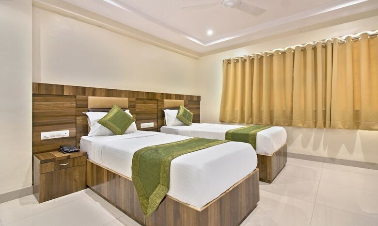 Treebo Trip Rk Hotel