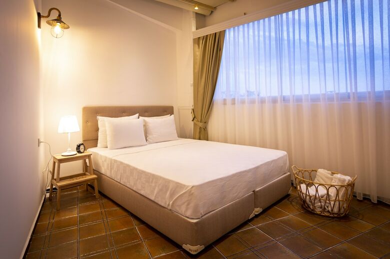 Guzi Rooms & Suites