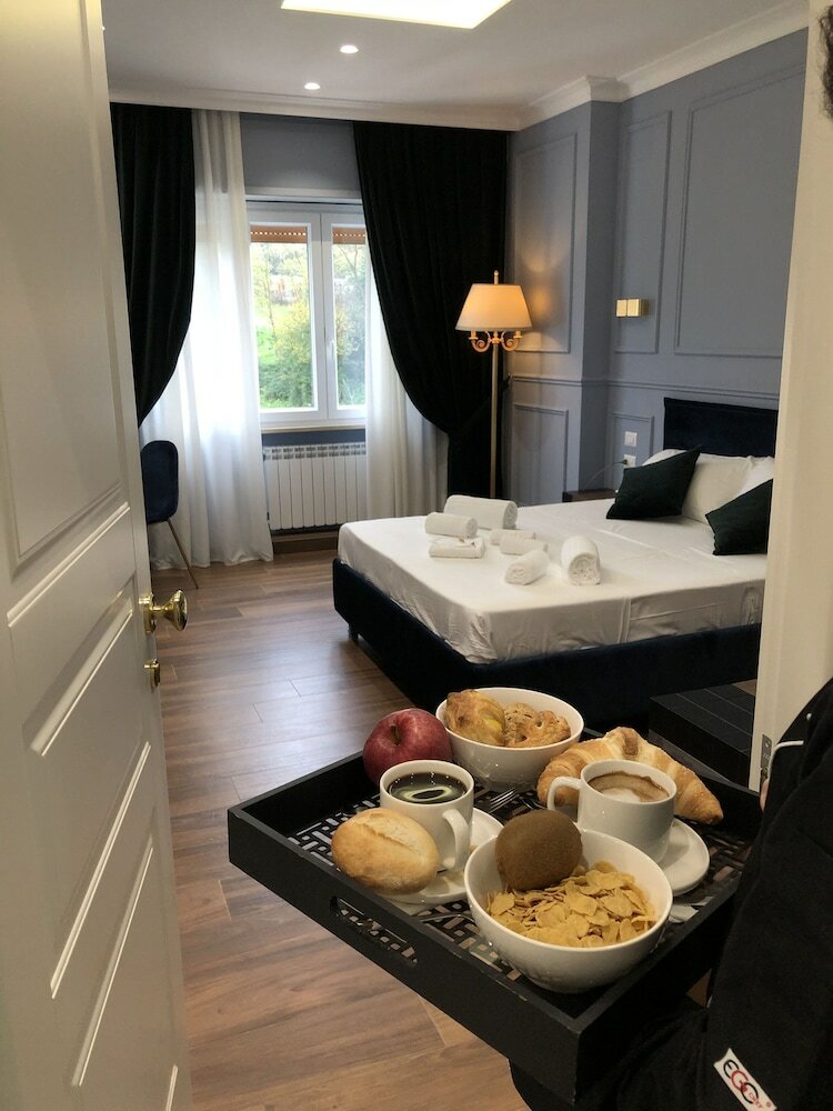 Bed & Breakfast Unicum Roma Suites