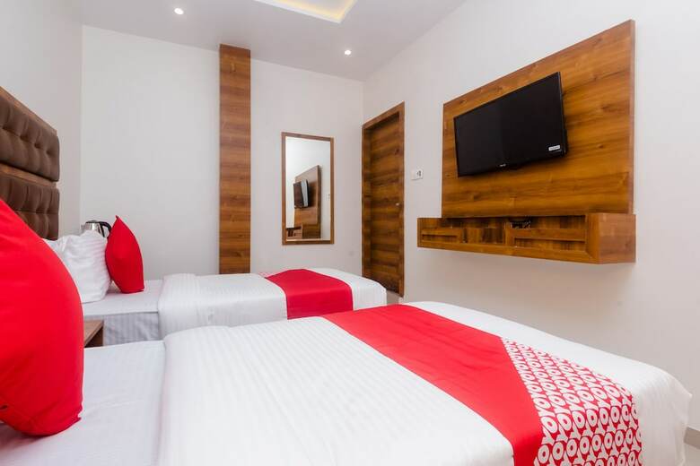 Hotel Capital O 30550 Riva International
