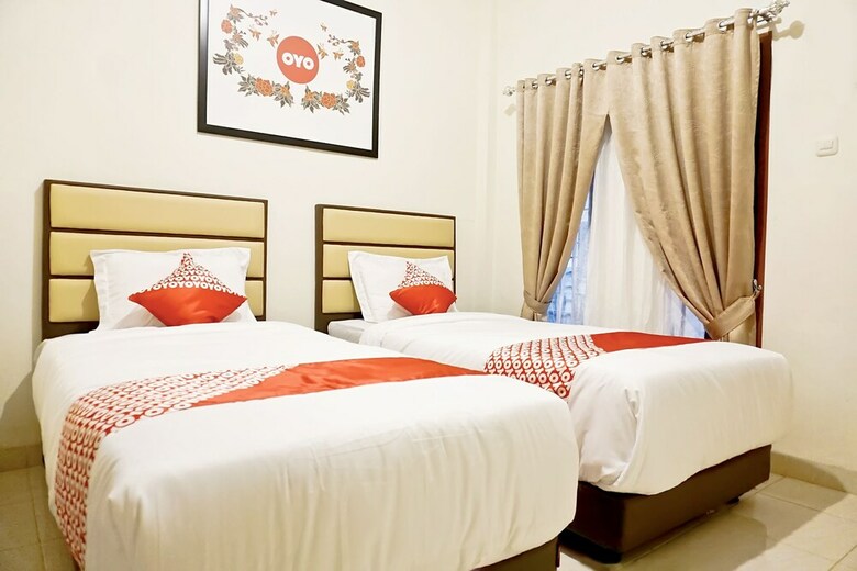 Hostal Oyo 1076 Dmc Homestay
