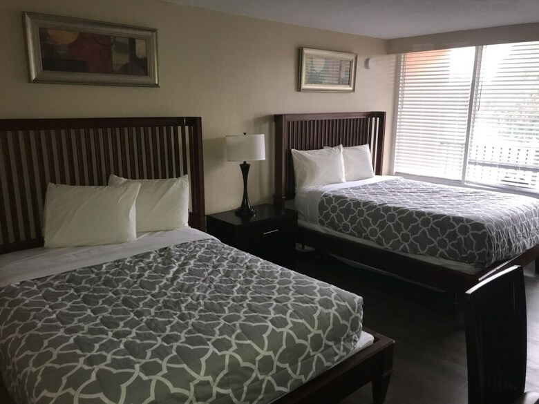 Hotel Apm Inn & Suites