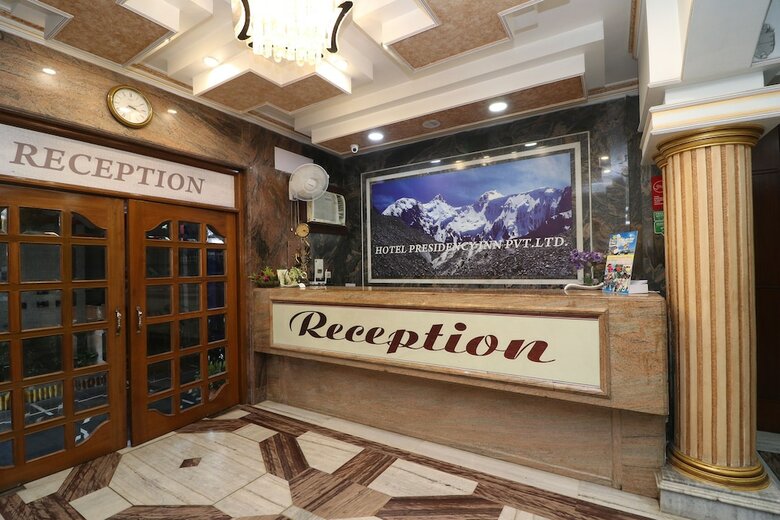 Capital O Hotel Presidency Inn