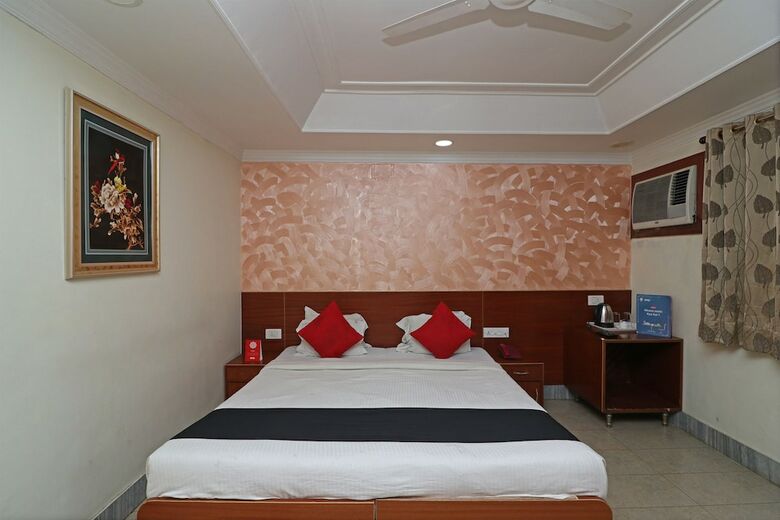 Capital O Hotel Presidency Inn