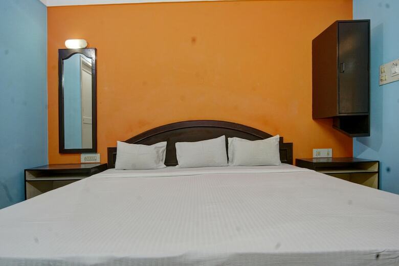 Hotel Spot On 39787 Radha Krishna Deluxe Lodge