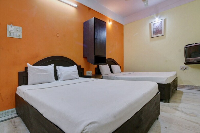 Hotel Spot On 39787 Radha Krishna Deluxe Lodge