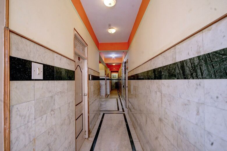Hotel Spot On 39787 Radha Krishna Deluxe Lodge