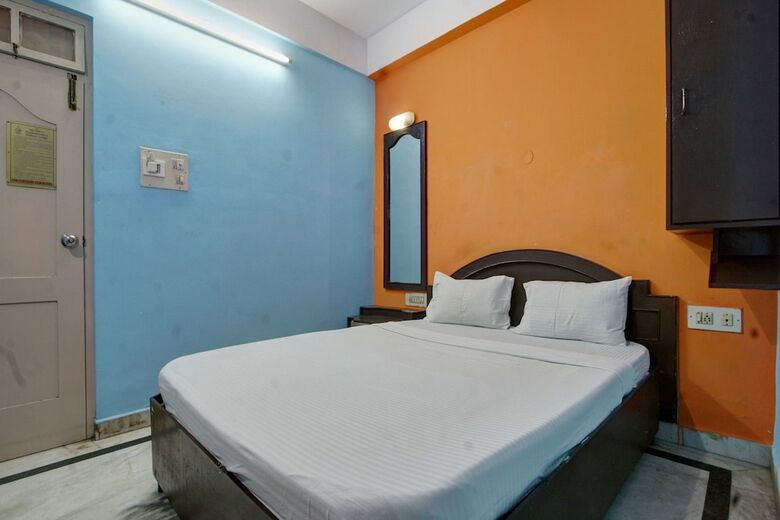 Hotel Spot On 39787 Radha Krishna Deluxe Lodge