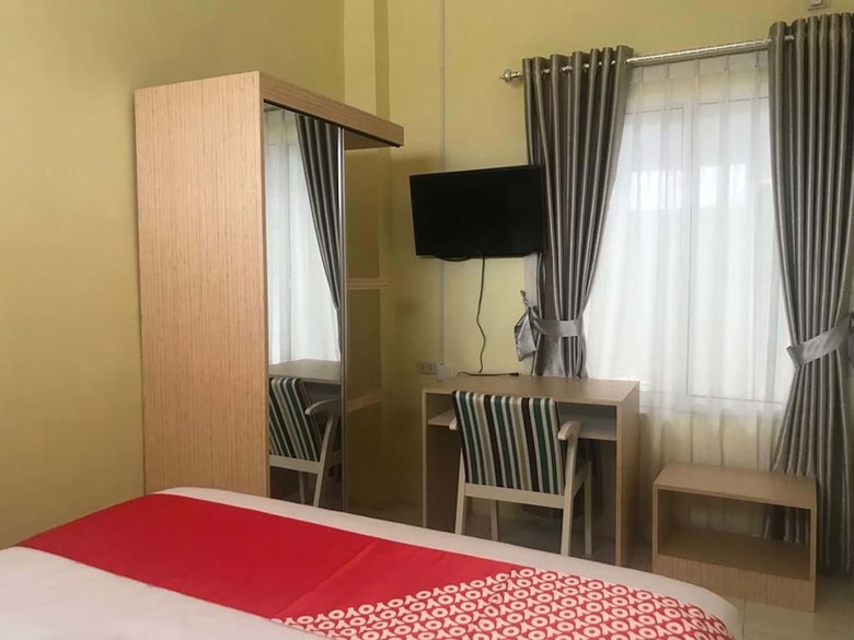 Hostal Oyo 1095 Rap Hotel