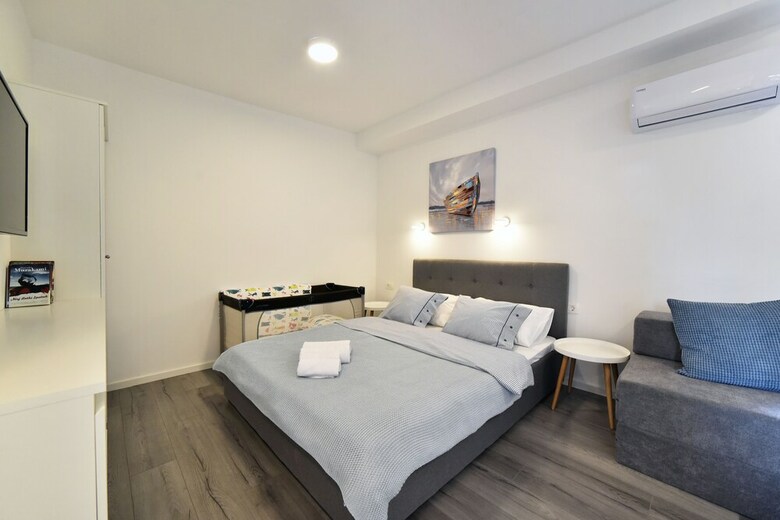 At Queens Apartments