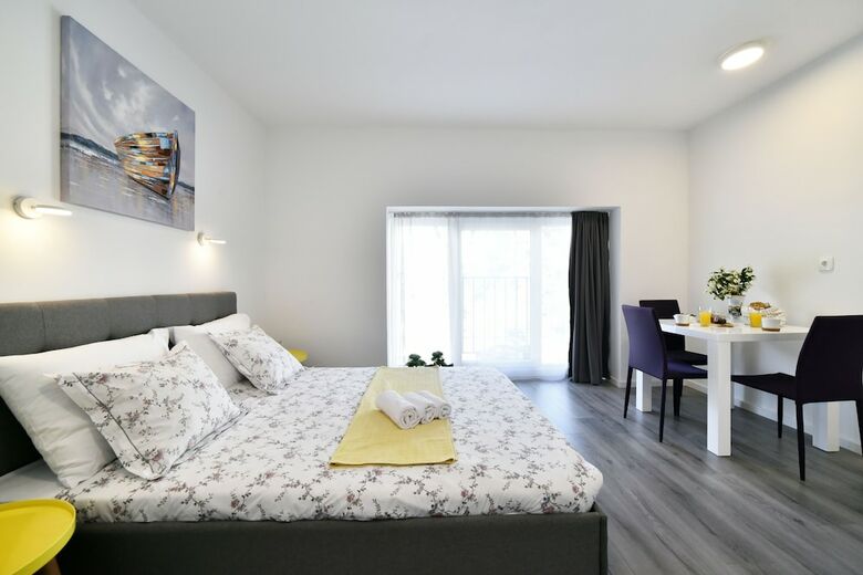 At Queens Apartments