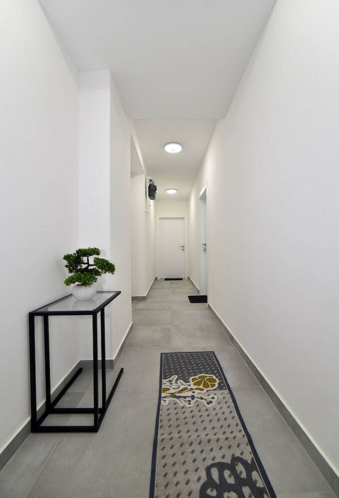 At Queens Apartments