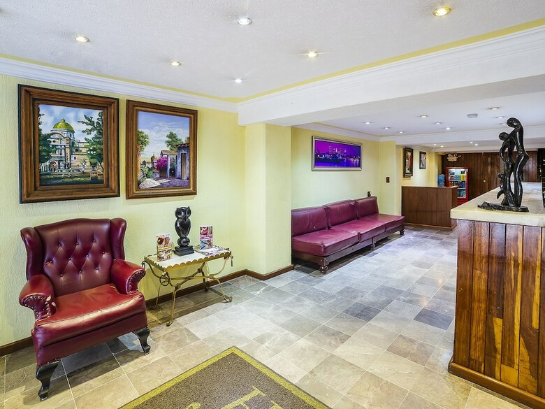 Hotel Capital O Rex