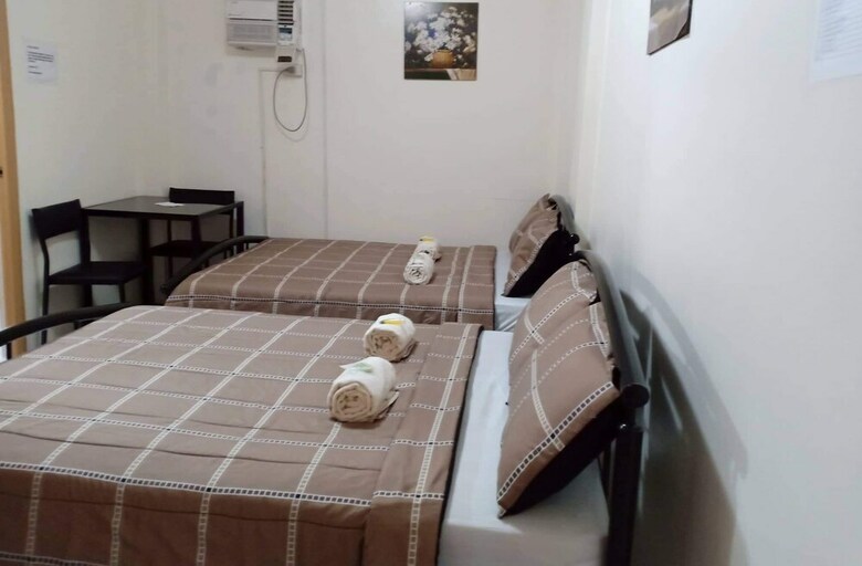 Hostal Dmc Caralos Vacation Inn And Dormitory