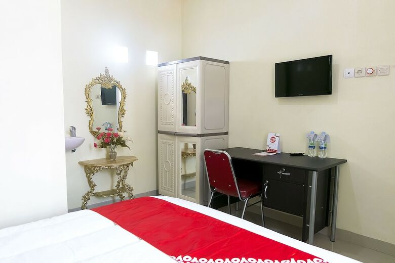 Hostal Oyo 1126 Trio R Kost
