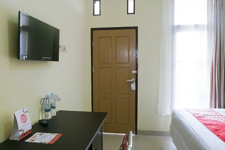 Hostal Oyo 1126 Trio R Kost
