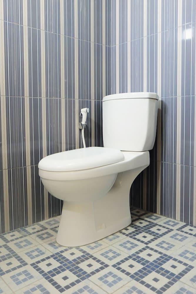 Hostal Oyo 1126 Trio R Kost
