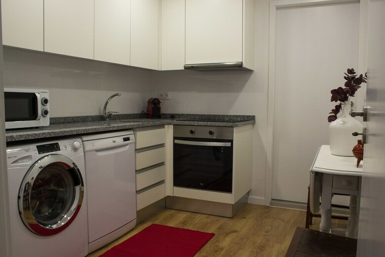 Apartamentos Red House By The River