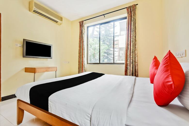 Hotel Capital O 49932 Orchard Suites