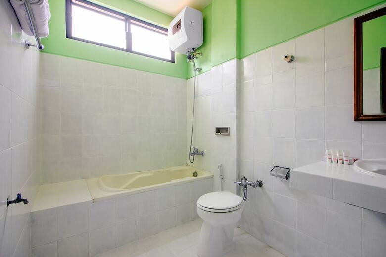 Hostal Oyo 1602 Trim Tiga Hotel