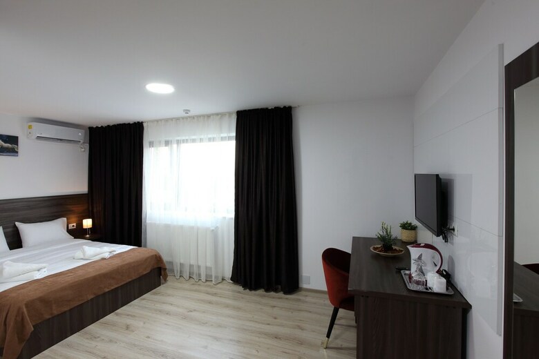 Bliss Hotel And Apartments
