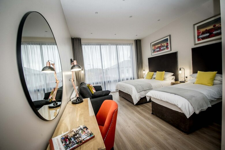 Apartamentos The James Suites