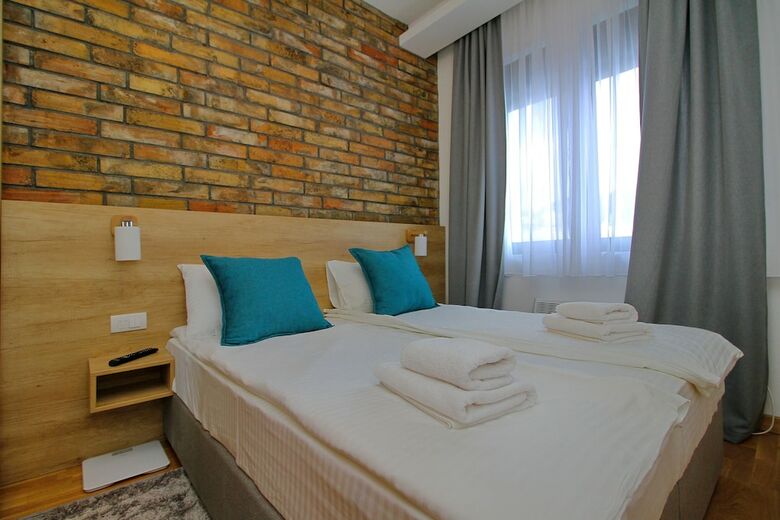 Apartamentos All Seasons Residence