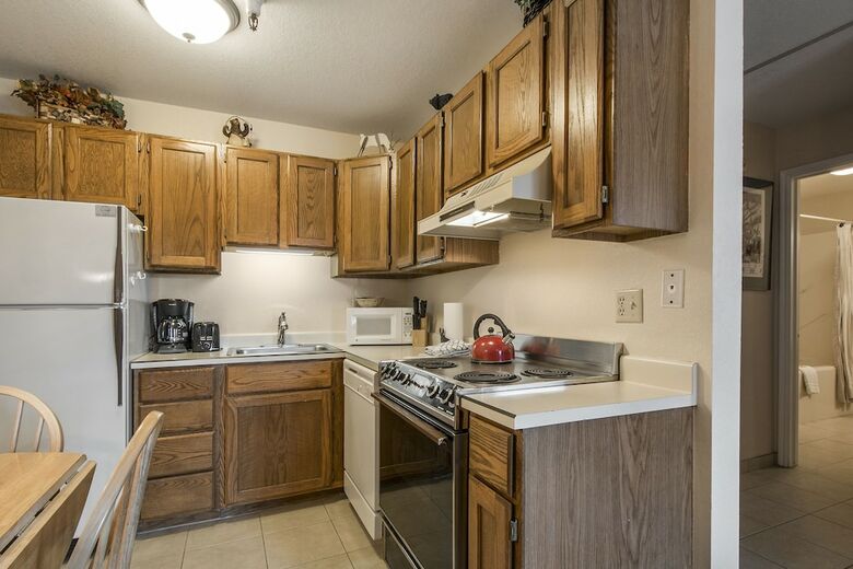 Carriage House Condominiums By All Seasons Resort Lodging