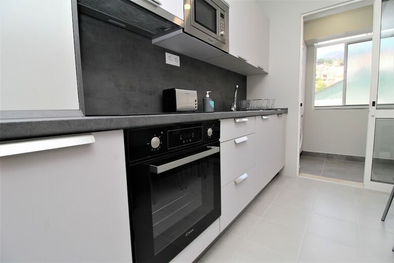 Grey Apartment In City Center With Sea View